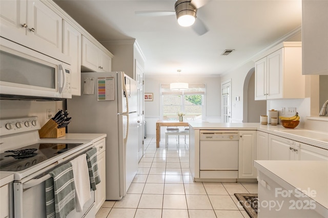 2079 Audubon Dr, Rock Hill, SC 29732 - kitchen featuring white appliances, a sink, light tile patterned floors, ceiling fan, and light countertops