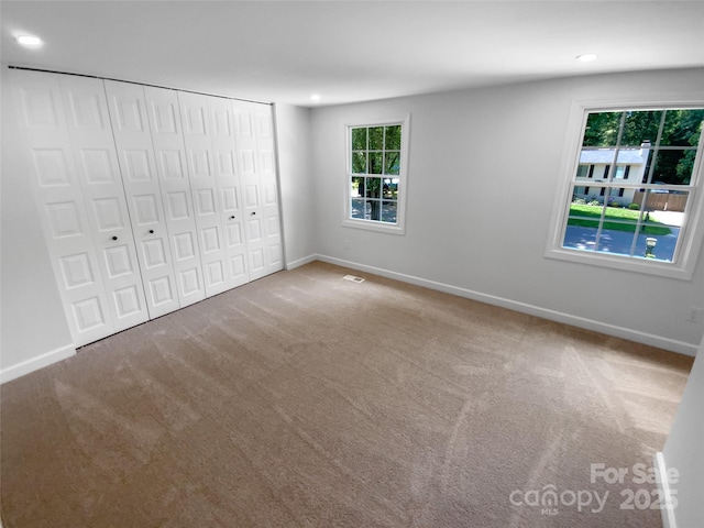 7134 Rollingridge Dr, Charlotte, NC 28211 - unfurnished bedroom with recessed lighting, baseboards, a closet, and carpet floors