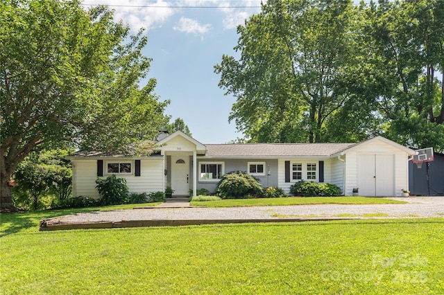 540 Oak Grove Rd, Flat Rock, NC 28731 - single story home with a front lawn, a shed, and a chimney