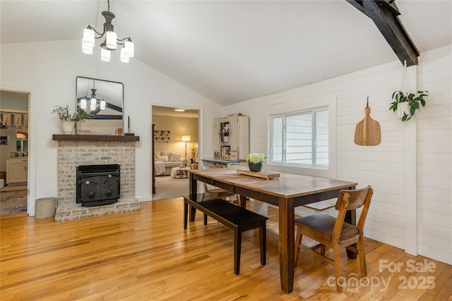 540 Oak Grove Rd, Flat Rock, NC 28731 - dining space featuring light wood-type flooring and a chandelier