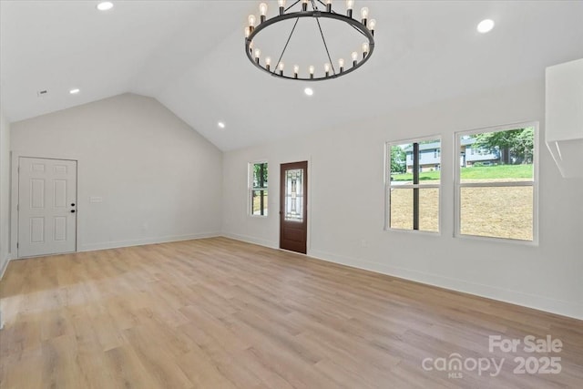 5526 Brookwood Ln, Hickory, NC 28602 - entrance foyer featuring a chandelier, plenty of natural light, lofted ceiling, recessed lighting, and light wood-type flooring