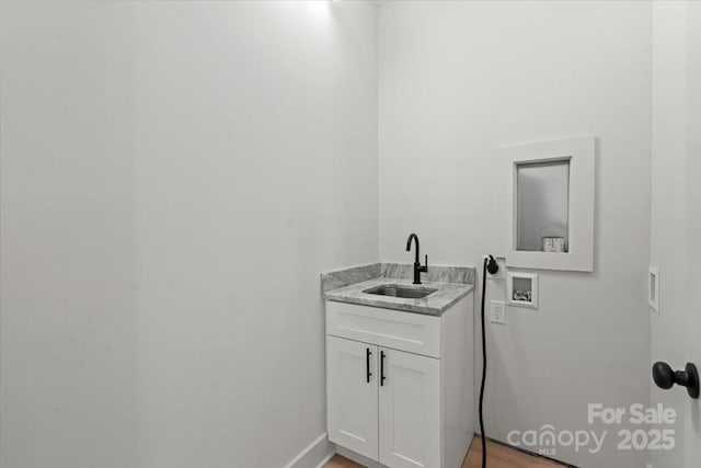 5526 Brookwood Ln, Hickory, NC 28602 - laundry room with hookup for a washing machine and cabinet space