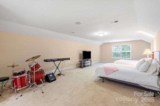 110 Isle Run Dr, Mooresville, NC 28117 - carpeted bedroom featuring vaulted ceiling and baseboards