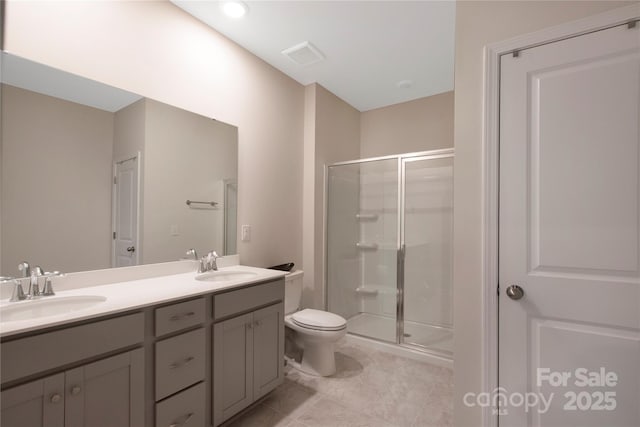 334 Kennerly Center Dr, Mooresville, NC 28115 - bathroom with a stall shower, double vanity, and tile patterned floors