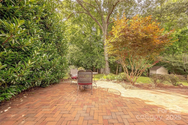 901 Clearbrook Rd, Matthews, NC 28105 - view of patio featuring a shed