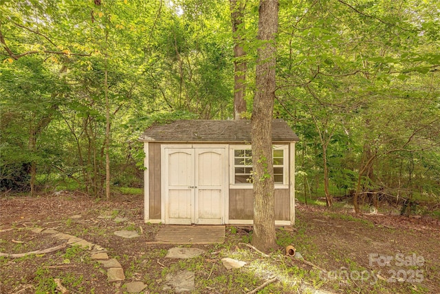 901 Clearbrook Rd, Matthews, NC 28105 - view of shed featuring a wooded view