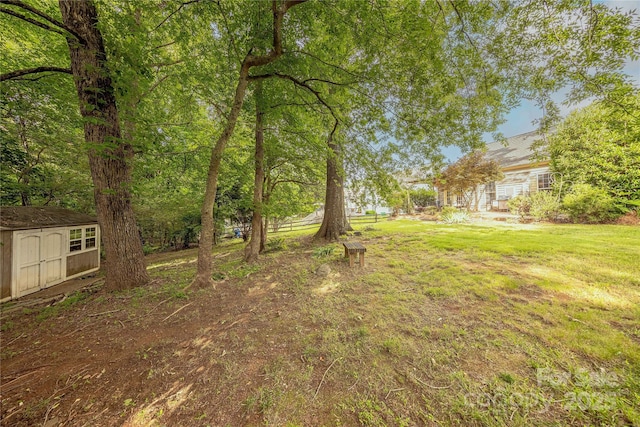 901 Clearbrook Rd, Matthews, NC 28105 - view of green lawn with a shed