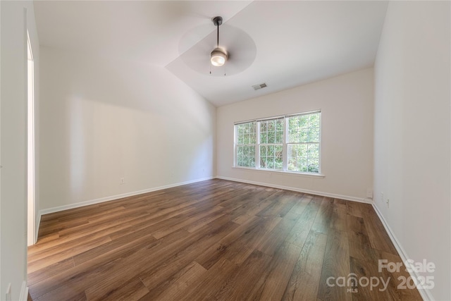 901 Clearbrook Rd, Matthews, NC 28105 - unfurnished room with dark wood finished floors, ceiling fan, and lofted ceiling