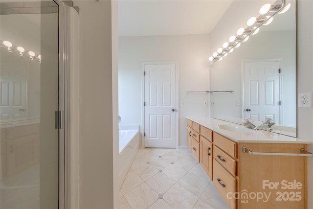 901 Clearbrook Rd, Matthews, NC 28105 - full bathroom with vanity, a garden tub, tile patterned floors, and a stall shower