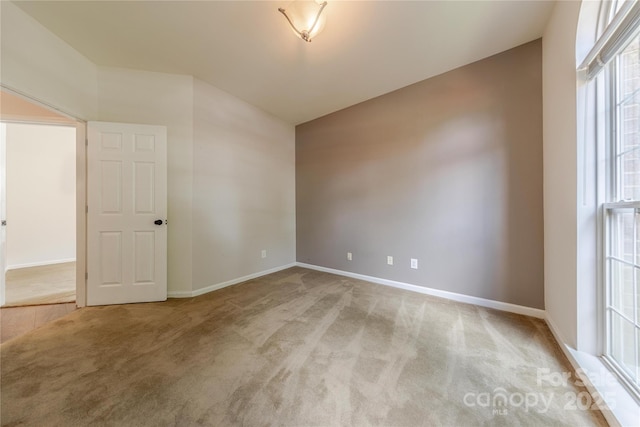 901 Clearbrook Rd, Matthews, NC 28105 - carpeted empty room featuring baseboards
