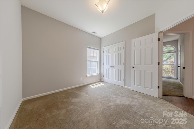 901 Clearbrook Rd, Matthews, NC 28105 - unfurnished bedroom with carpet and a closet