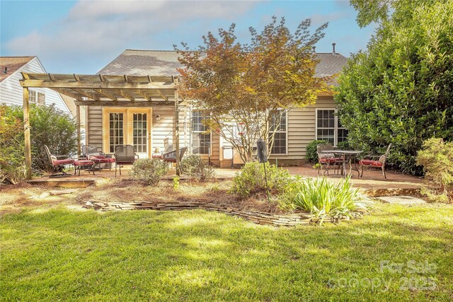901 Clearbrook Rd, Matthews, NC 28105 - rear view of property featuring a patio, a pergola, a lawn, and roof with shingles