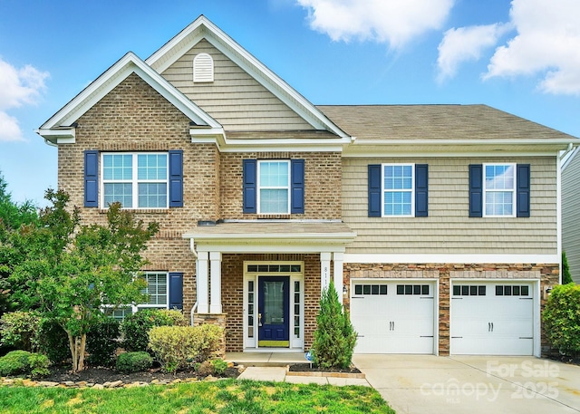 8115 Kelburn Ln, Charlotte, NC 28273 - view of front of house with an attached garage, brick siding, concrete driveway, and roof with shingles