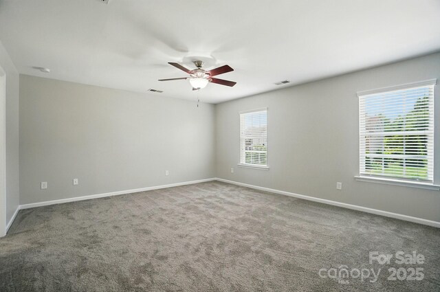 8115 Kelburn Ln, Charlotte, NC 28273 - unfurnished room featuring a ceiling fan and carpet