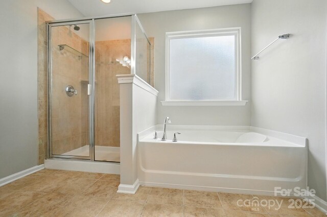 8115 Kelburn Ln, Charlotte, NC 28273 - full bathroom featuring a stall shower, a garden tub, and tile patterned floors