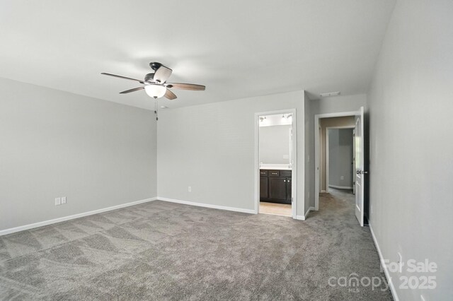 8115 Kelburn Ln, Charlotte, NC 28273 - spare room with a ceiling fan and light colored carpet