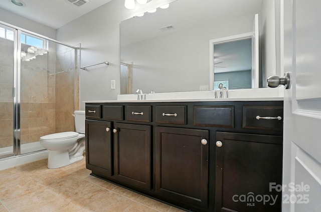 8115 Kelburn Ln, Charlotte, NC 28273 - bathroom featuring double vanity, a stall shower, and tile patterned flooring