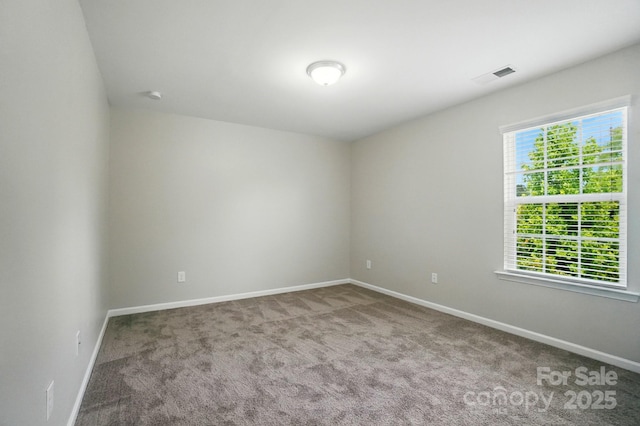 8115 Kelburn Ln, Charlotte, NC 28273 - carpeted spare room featuring baseboards