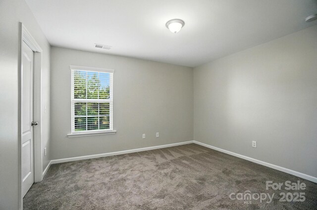 8115 Kelburn Ln, Charlotte, NC 28273 - empty room featuring baseboards and carpet flooring