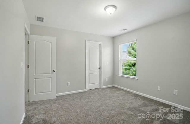 8115 Kelburn Ln, Charlotte, NC 28273 - unfurnished bedroom featuring carpet flooring