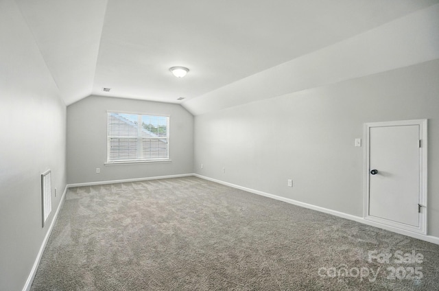8115 Kelburn Ln, Charlotte, NC 28273 - bonus room featuring carpet floors and vaulted ceiling