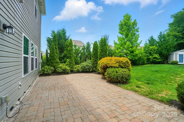 8115 Kelburn Ln, Charlotte, NC 28273 - view of patio featuring a shed
