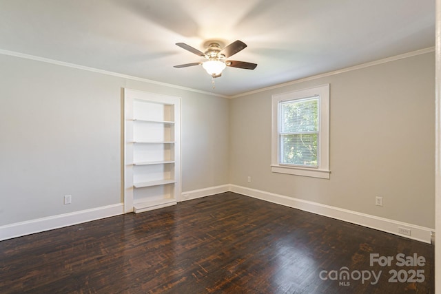115 E Catawba St, Morganton, NC 28655 - spare room with built in features, dark wood-style floors, a ceiling fan, and ornamental molding
