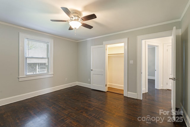 115 E Catawba St, Morganton, NC 28655 - unfurnished bedroom featuring dark wood-type flooring, ornamental molding, and a ceiling fan