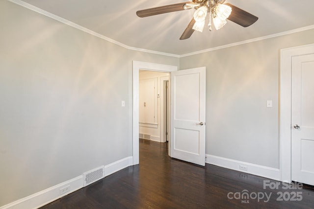 115 E Catawba St, Morganton, NC 28655 - empty room featuring a ceiling fan, dark wood finished floors, and crown molding