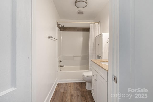 115 E Catawba St, Morganton, NC 28655 - bathroom featuring wood finished floors, shower / tub combo with curtain, and vanity