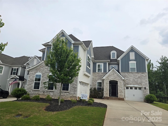 5000 Britannia Blvd, Waxhaw, NC 28173 - traditional-style home featuring stone siding, driveway, and an attached garage