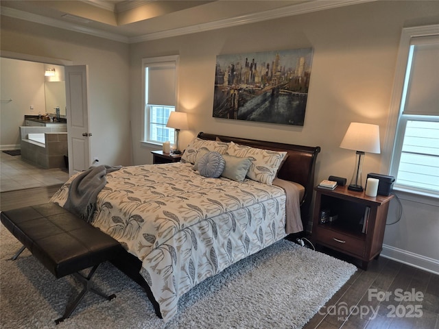 5000 Britannia Blvd, Waxhaw, NC 28173 - bedroom featuring ornamental molding, wood finished floors, multiple windows, and baseboards