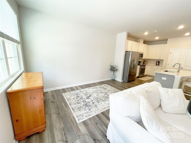 8060 Scarlet Maple Ln, Tega Cay, SC 29708 - living area with dark wood-style flooring and recessed lighting