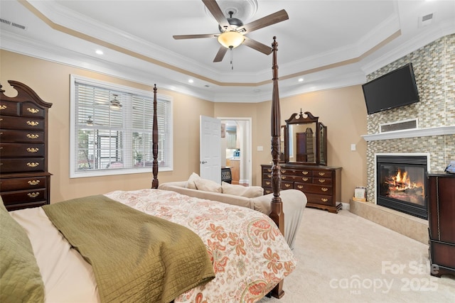 1912 Dawnhurst Ln, York, SC 29745 - carpeted bedroom featuring ornamental molding, a tiled fireplace, a raised ceiling, and recessed lighting