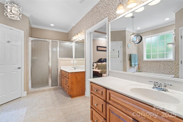 1912 Dawnhurst Ln, York, SC 29745 - bathroom featuring two vanities, crown molding, a shower stall, tile patterned floors, and recessed lighting