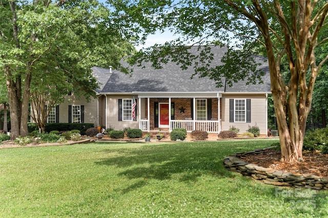 1912 Dawnhurst Ln, York, SC 29745 - cape cod home featuring covered porch, roof with shingles, a front lawn, and brick siding