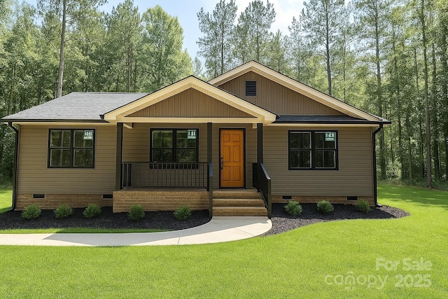 2330 Neill Rd, Lancaster, SC 29720 - view of front facade with crawl space, a porch, a front yard, and board and batten siding
