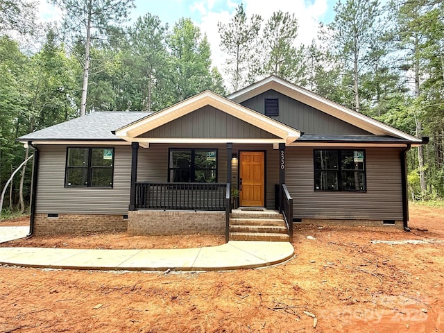 2330 Neill Rd, Lancaster, SC 29720 - view of front facade with crawl space, covered porch, and roof with shingles