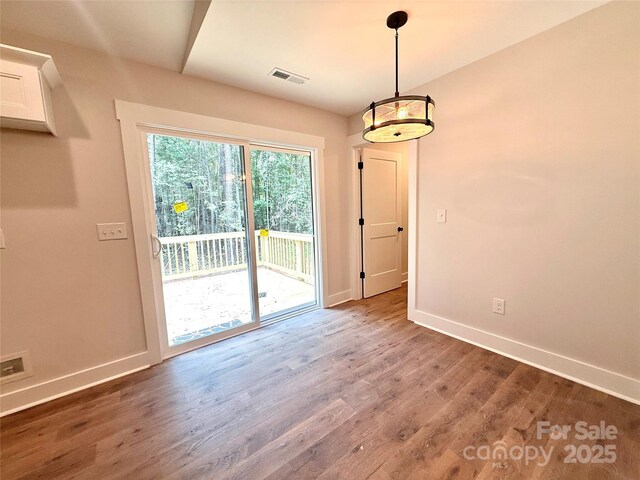 2330 Neill Rd, Lancaster, SC 29720 - unfurnished dining area with baseboards and wood finished floors