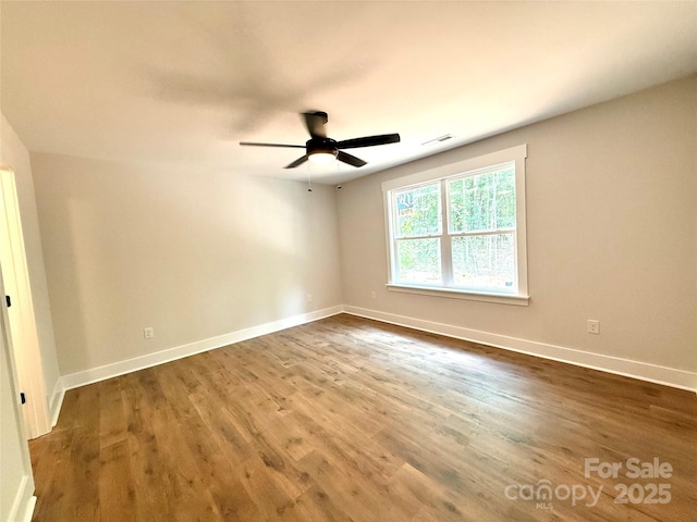 2330 Neill Rd, Lancaster, SC 29720 - empty room with a ceiling fan and wood finished floors