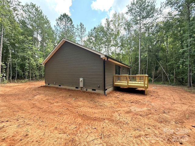 2330 Neill Rd, Lancaster, SC 29720 - view of property exterior with crawl space, a wooden deck, and a view of trees