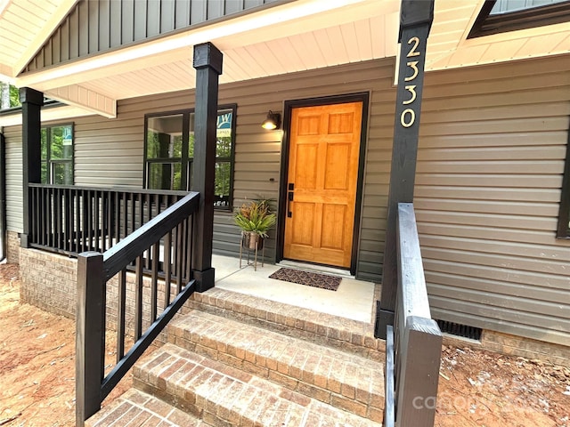2330 Neill Rd, Lancaster, SC 29720 - entrance to property featuring covered porch and board and batten siding