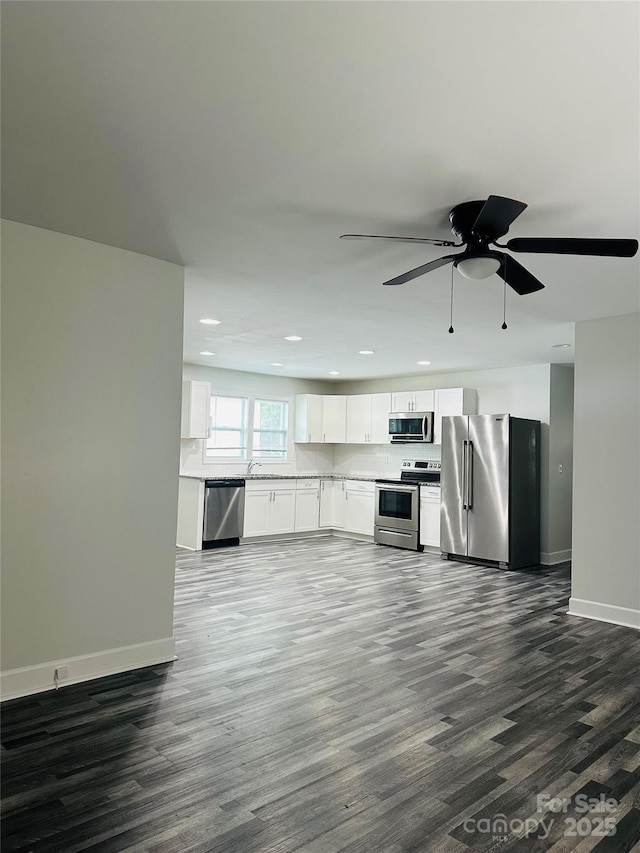 1535 Jordan St, Lancaster, SC 29720 - unfurnished living room with dark wood-style floors, recessed lighting, and ceiling fan