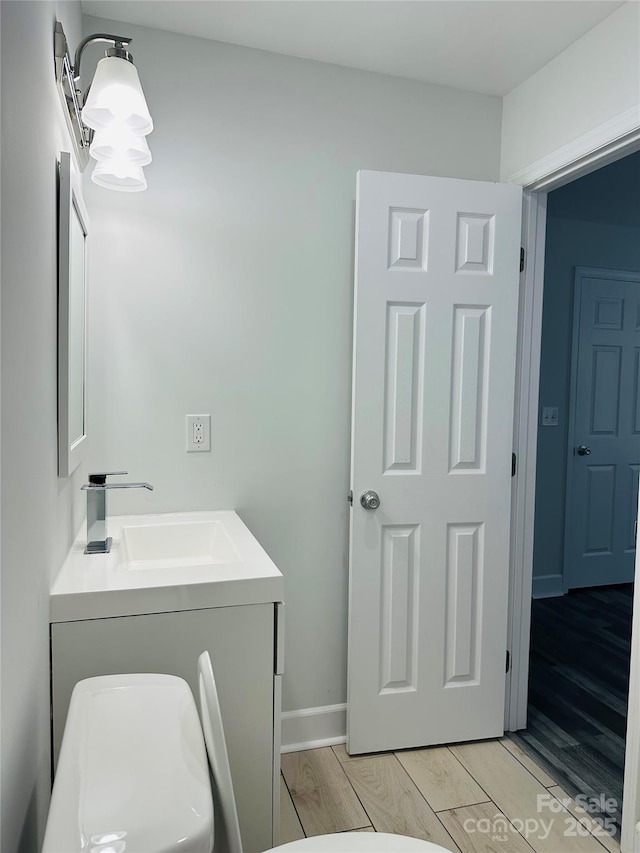 1535 Jordan St, Lancaster, SC 29720 - bathroom with vanity and wood finished floors