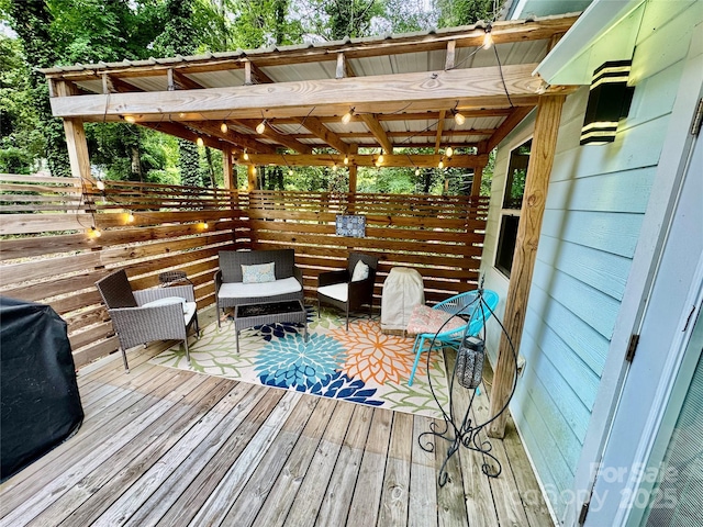 401 Church St, Warrenton, NC 27589 - deck with view of wooded area and grilling area