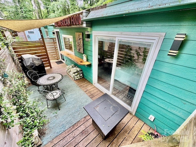 401 Church St, Warrenton, NC 27589 - wooden deck featuring a grill