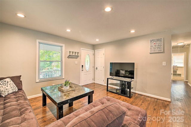 3020 Stancill Pl, Charlotte, NC 28205 - living room featuring recessed lighting, wood finished floors, healthy amount of natural light, attic access, and baseboards