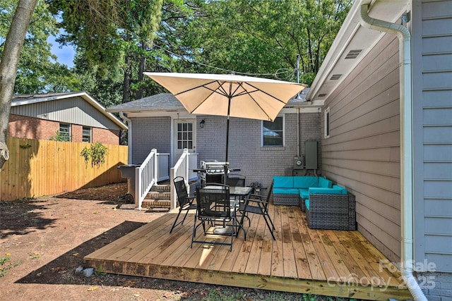 3020 Stancill Pl, Charlotte, NC 28205 - wooden terrace featuring outdoor lounge area, outdoor dining space, and view of wooded area