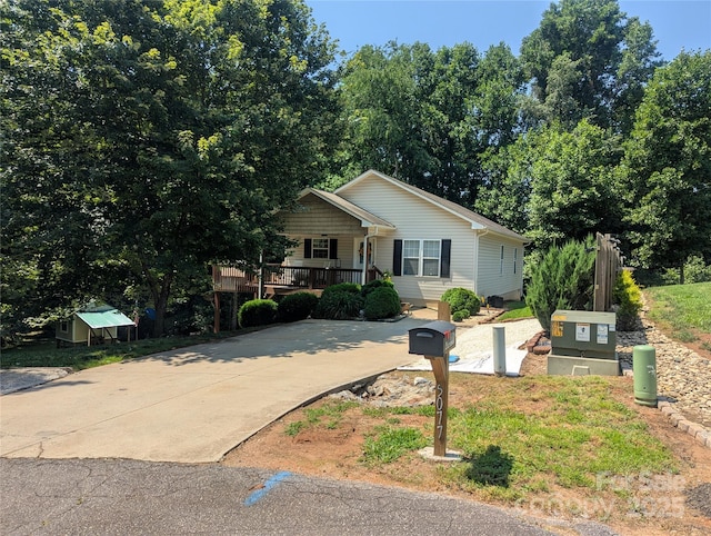 5077 Edney Ct, Granite Falls, NC 28630 - view of front of house with a porch and driveway
