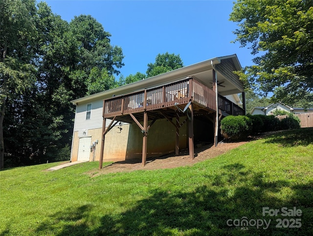 5077 Edney Ct, Granite Falls, NC 28630 - rear view of property with a ceiling fan, a wooden deck, and a lawn